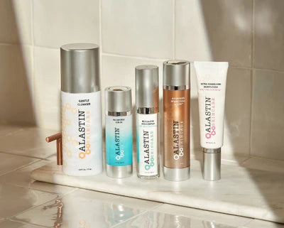 Set of Galastin skincare products on a tiled surface